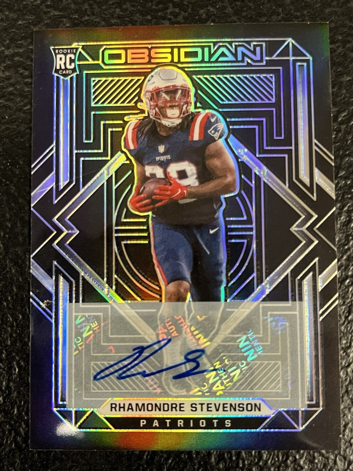 2021 Obsidian 136 Rhamondre Stevenson RC Auto /199 New England Patriots