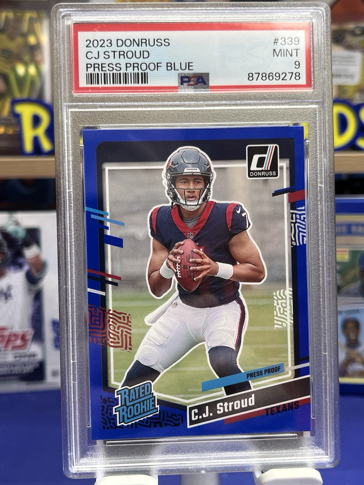 2023 Panini Donruss Press Proof Blue #339 CJ Stroud RC PSA 9 Mint Texans
