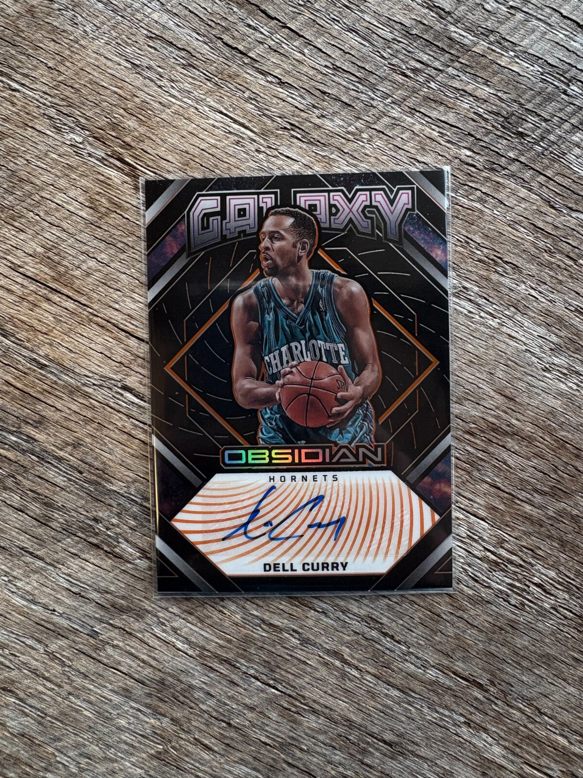 2022-23 Obsidian Galaxy Orange Electric Etch Dell Curry Auto #/50 Hornets