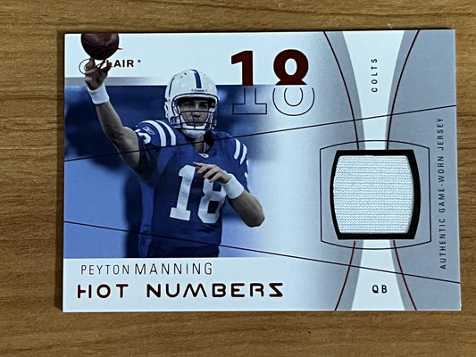 2004 Flair Hot Numbers Game Used Red #HN-PM Peyton Manning Colts /150