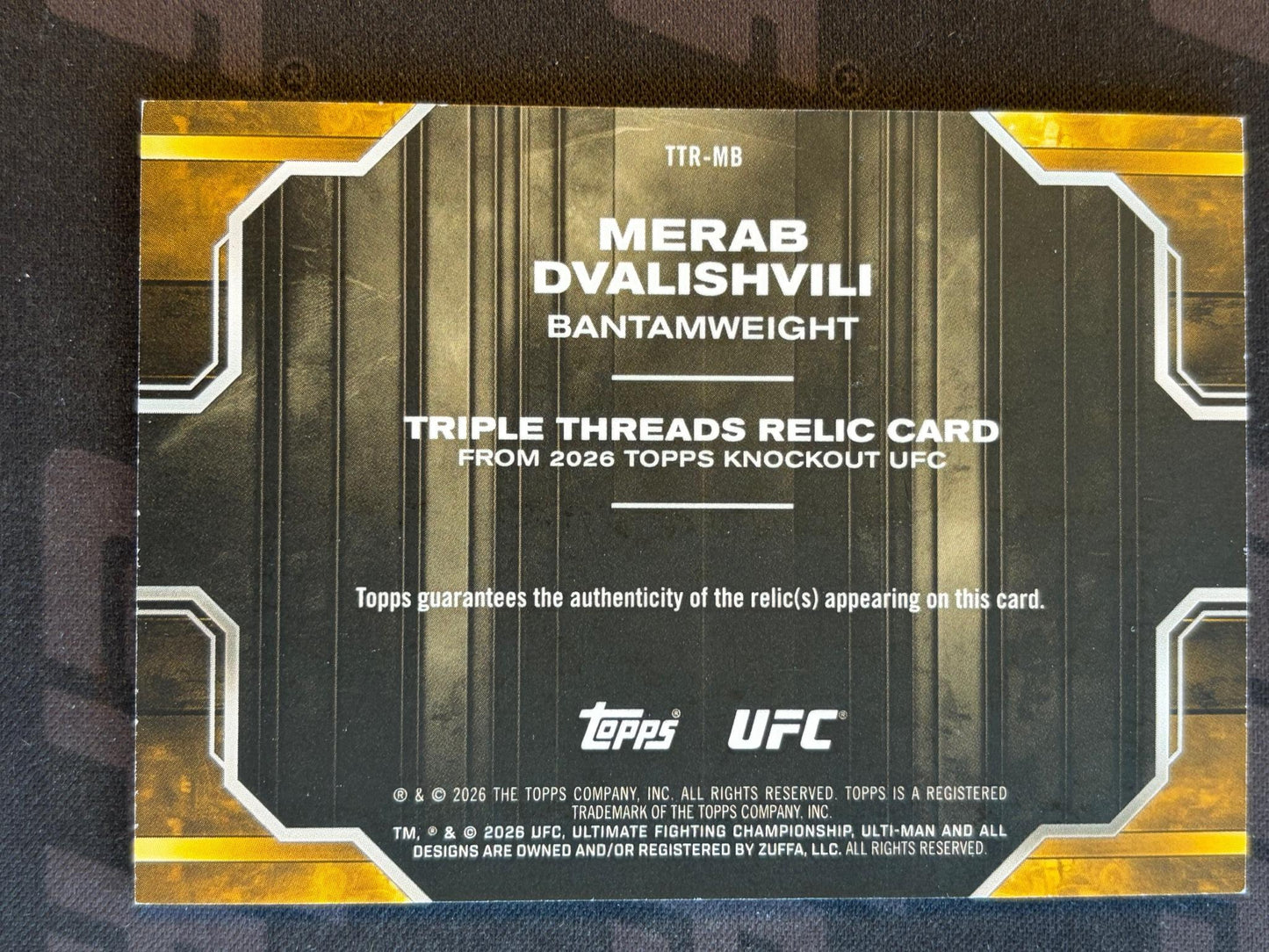 2026 Topps Knockout UFC Triple Threads Relics #TTR-MB Merab Dvalishvili #/199